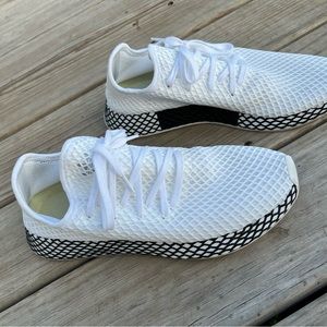 Men’s white Adidas shoes